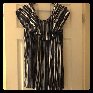 Woman’s top on or off shoulder.